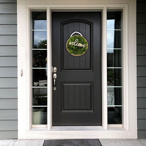 Moss Plaque on front door