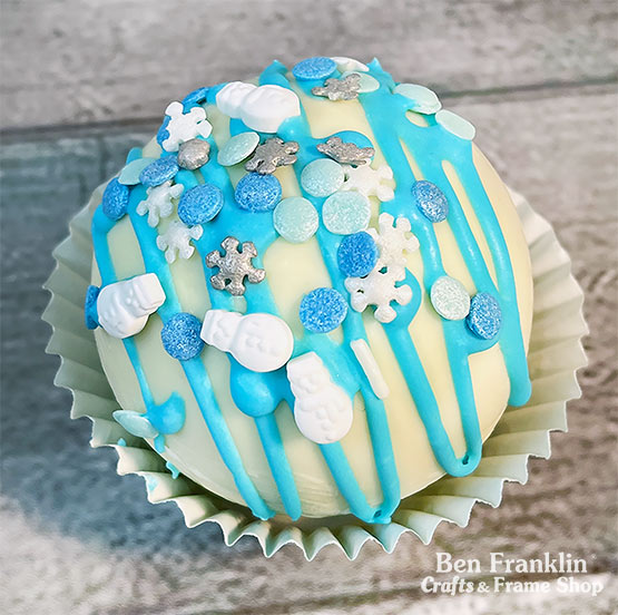 Cocoa bombs with blue snowflakes