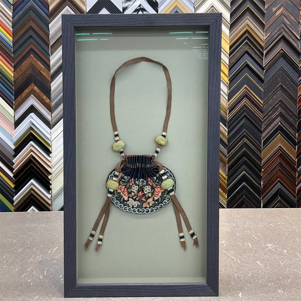 Custom Shadow Box featuring a satchel